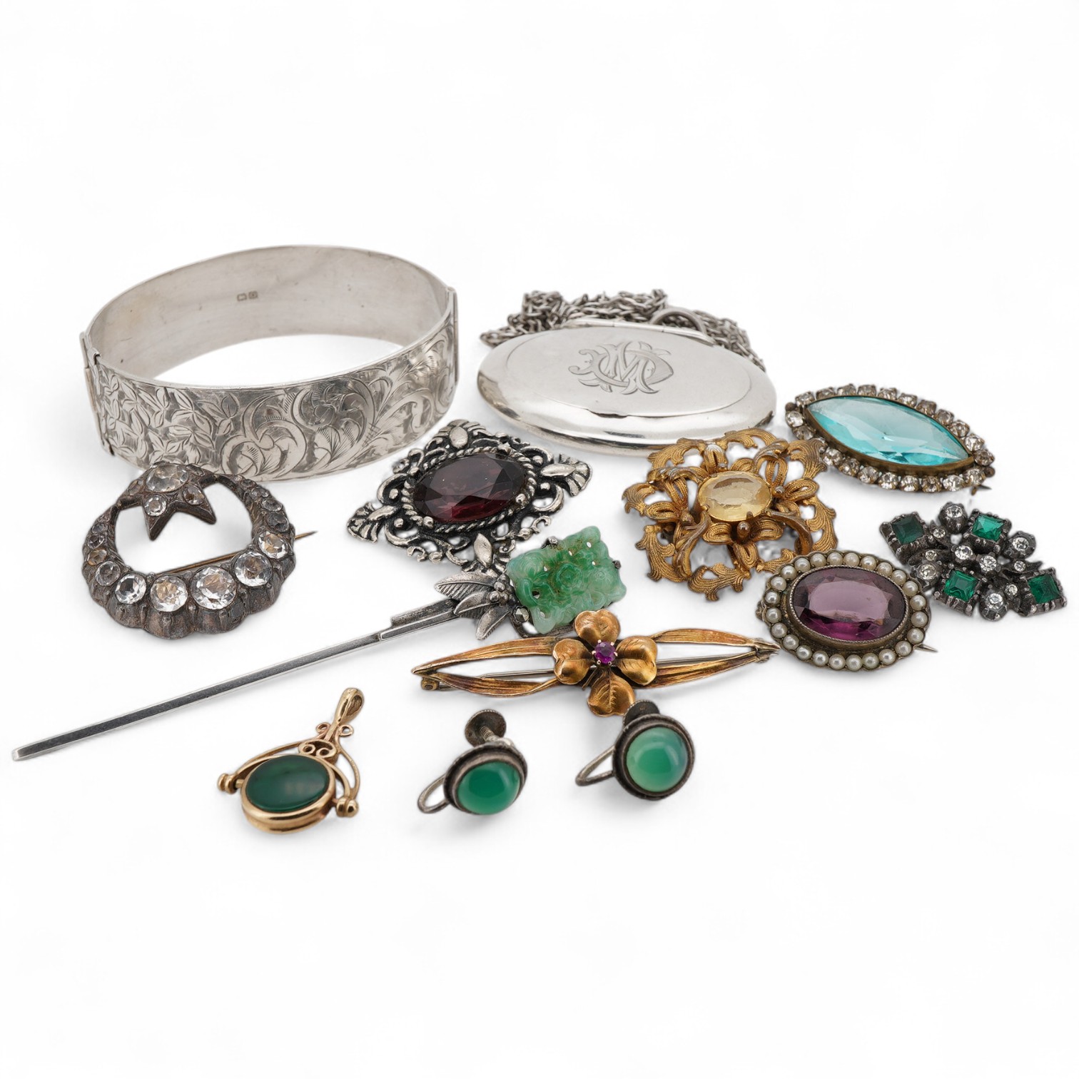 A small collection of assorted costume jewellery, including a paste set crescent brooch and a spinning fob seal, together with a George V silver oval pill box, Adie & Lovekin, Birmingham, 1915, 52mm, with engraved monogr